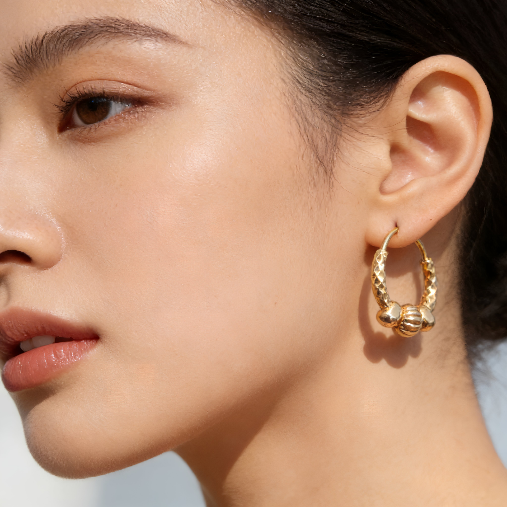 Textured Gold Hoop Earrings with Triple Bead Detail